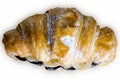 Croissant with chocolate butter and banana isolated on a white background.