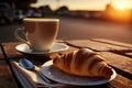 croissant and coffee breakfast at dawn