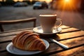 croissant and coffee breakfast at dawn