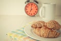 Croissant coffee for Breakfast red alarm clock Royalty Free Stock Photo