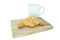 Croissant and coffee on wooden in white background Royalty Free Stock Photo