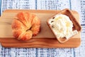 Croissant with cream cheese and bowl Royalty Free Stock Photo