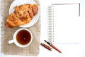 Croissant cup coffee white book Royalty Free Stock Photo