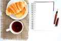 Croissant cup coffee white book Royalty Free Stock Photo