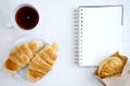 Croissant cup coffee white book Royalty Free Stock Photo