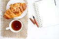 Croissant cup coffee white book Royalty Free Stock Photo