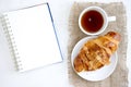 Croissant cup coffee white book table top Royalty Free Stock Photo