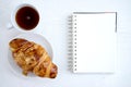 Croissant cup coffee white book Royalty Free Stock Photo