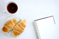 Croissant cup coffee white book Royalty Free Stock Photo