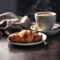 Croissant and a cup of coffee on white table Royalty Free Stock Photo