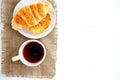 Croissant cup coffee white table Royalty Free Stock Photo