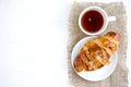 Croissant cup coffee white table top Royalty Free Stock Photo