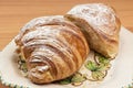 Croissant cut in half in a dish Royalty Free Stock Photo