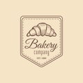 Croissant logo. Vintage bakery icon. Retro emblem of sweet cookie. Hipster pastry label. Biscuit sign. Desert illustration.