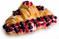 Croissant sandwiche with berries isolated on a white background