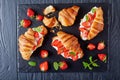 Croissant sandwiches with fresh ripe strawberries Royalty Free Stock Photo