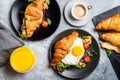 Croissant sandwiches with Fried Egg, Salad Leaves, Grilled Mushr