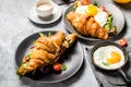 Croissant sandwiches with Fried Egg, Salad Leaves, Grilled Mushr