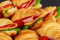 Croissant sandwiches with ham and lettuce, closeup Royalty Free Stock Photo