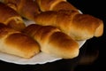 Croissant shaped Breakfast Pastry with a poppy seed stuffing