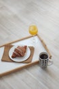 Croissant White Chocolate Breakfast Morning on white background. Cup of Tea or coffee. Rustic Style. Orange Juice. copy space.