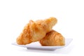 Croissant on white plate isolated over white background with clipping path. Croissant french breakfast