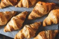 Croissants on baker's paper. Royalty Free Stock Photo