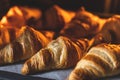 Croissants baking in oven. Royalty Free Stock Photo