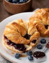 Croissants with blueberry jam Royalty Free Stock Photo
