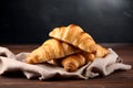 Croissants, Breakfast Food Concept. Pile Of Freshly Baked Crispy Croissants On A Wooden Rustic Table Against Dark Background, Copy