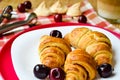 Croissants with cherry marmalade and coffee