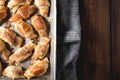 Croissants with chocolate on baking tray Royalty Free Stock Photo