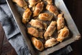 Croissants with chocolate on baking tray Royalty Free Stock Photo