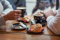 Croissants and coffee, french breakfast in cafe in Paris