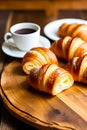 Croissants on old wood table generated by ai