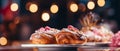 Croissants with raspberries on a white plate on a dark horizontal blurred background with bokeh effect, close-up