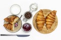 Croissants on wicker plate Royalty Free Stock Photo