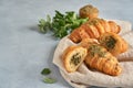 Croissants with zaatar on linen napkin board. Closeup , copy space