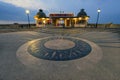 Cromer pier at sunset with pavilion lights as stars