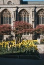 Blossoming flowers in front of a Parish Church in Cromer, Norfolk, UK Royalty Free Stock Photo