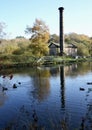 The Leawood Pump House (1849) reflected in the still water of Cromford Canal. Cromford, , Derbyshire, UK. Royalty Free Stock Photo