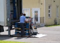 Shipping Employee Delivering Food Supplies