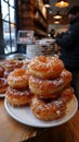 A cronut is a combination of a croissant and a doughnut, where the croissant dough is baked like a donut and is usually