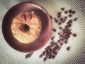 Cronut or doughnut coffee flavor with coffee beans decoration