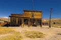 Crooked abandoned western saloon building and shop in Bodie Ghost Town Royalty Free Stock Photo