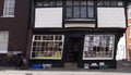 Second-hand bookshop in the Crooked House, one of the oldest buildings in Canterbury, England