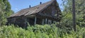 Crooked old abandoned wooden house