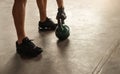 Sporty man exercising with kettlebell in gym Royalty Free Stock Photo