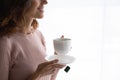 Close up of happy young woman drinking black tea Royalty Free Stock Photo