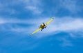 Crop duster flying in the sky Royalty Free Stock Photo